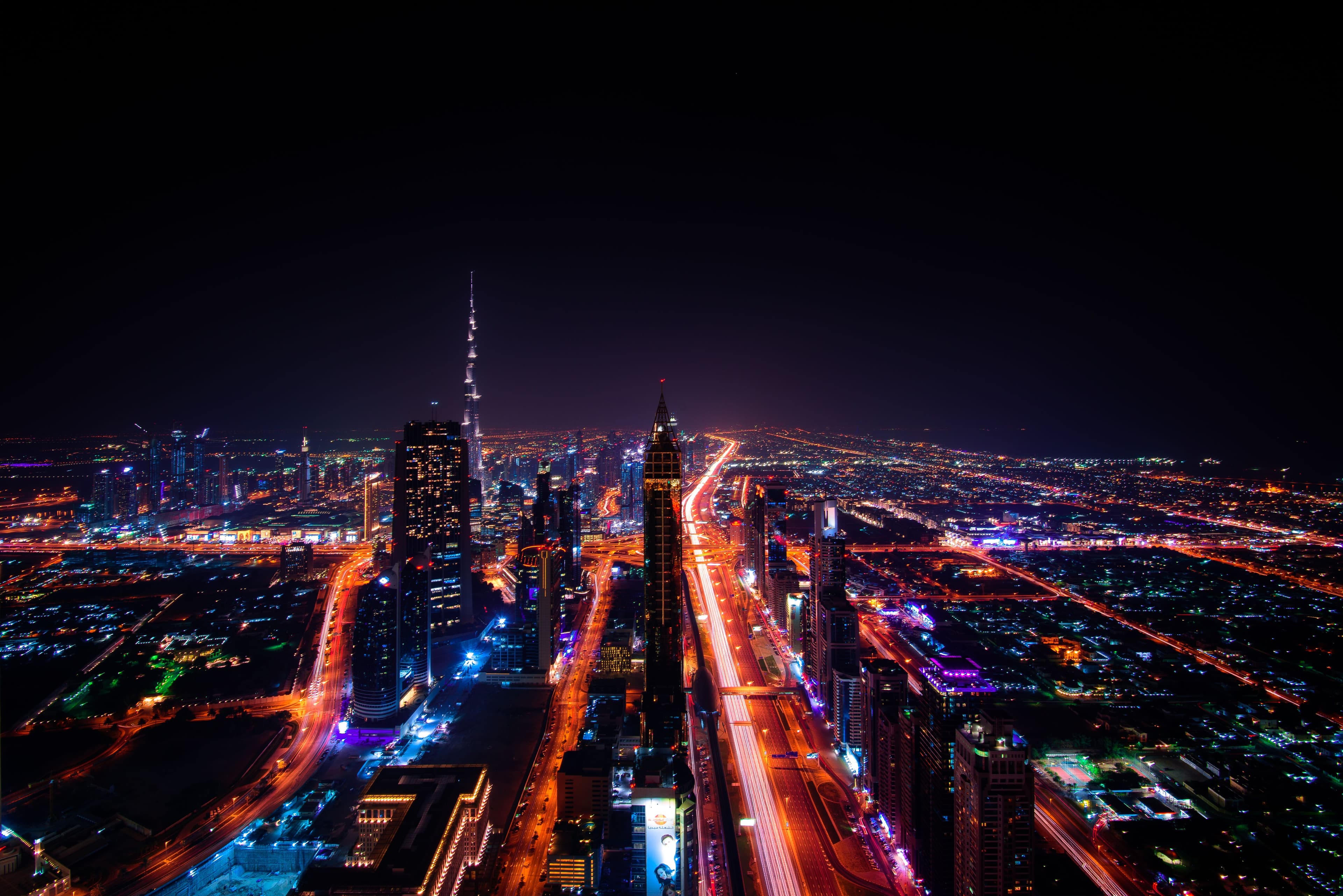 Loops of light painted against a night sky in a long exposure